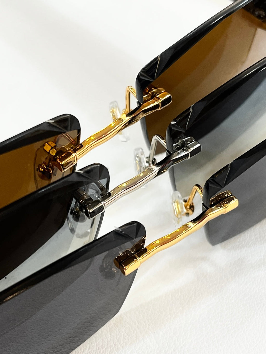CARTIER C DE RIMLESS RECTANGULAR FRAME SUNGLASSES CT0612S IN METAL
