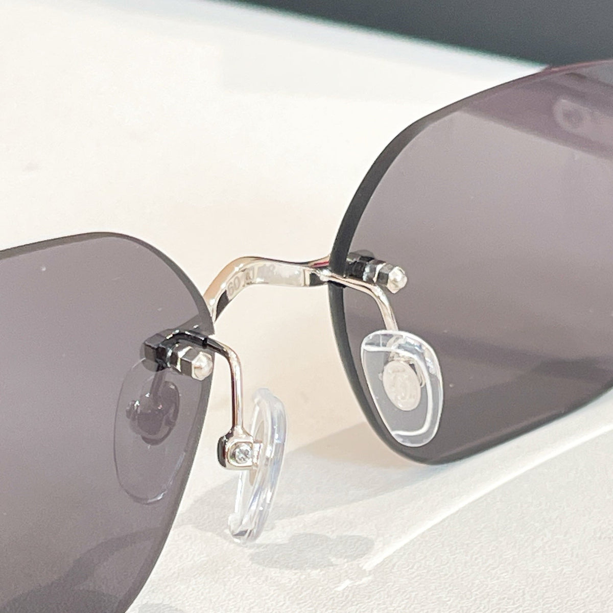 CARTIER C DE RIMLESS GEOMETRIC FRAME SUNGLASSES 579510 IN METAL AND WOODEN